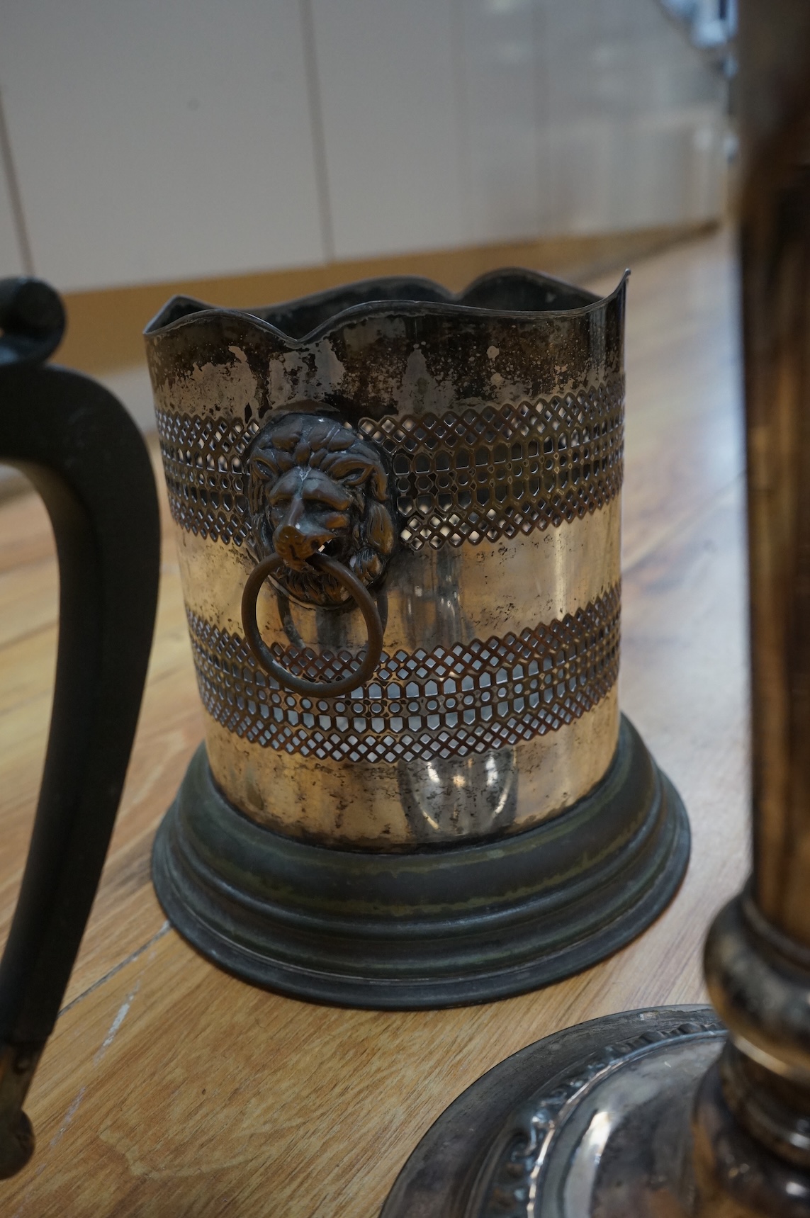 A group of assorted plated ware, including a pair of candlesticks, a salver, toast rack and cutlery including set of mother of pearl handled dessert eaters, together with a George V silver mounted trinket box and two sil